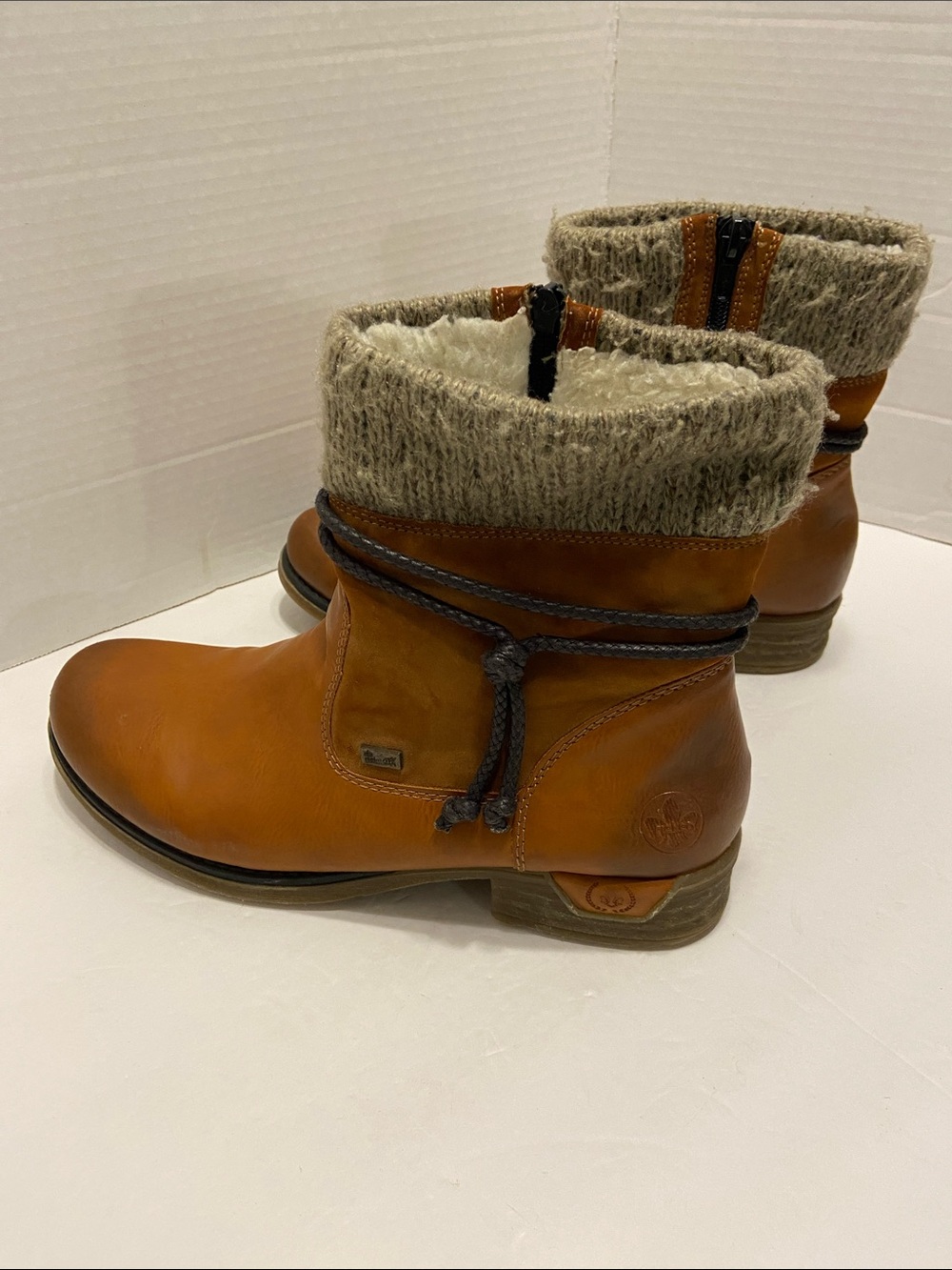 Rieker ankle boots, a cozy Rustic textured Sherpa collar leather cord Size 10